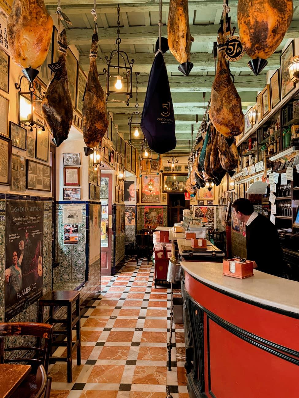 Busy tapas bar counter in an Andalusian town